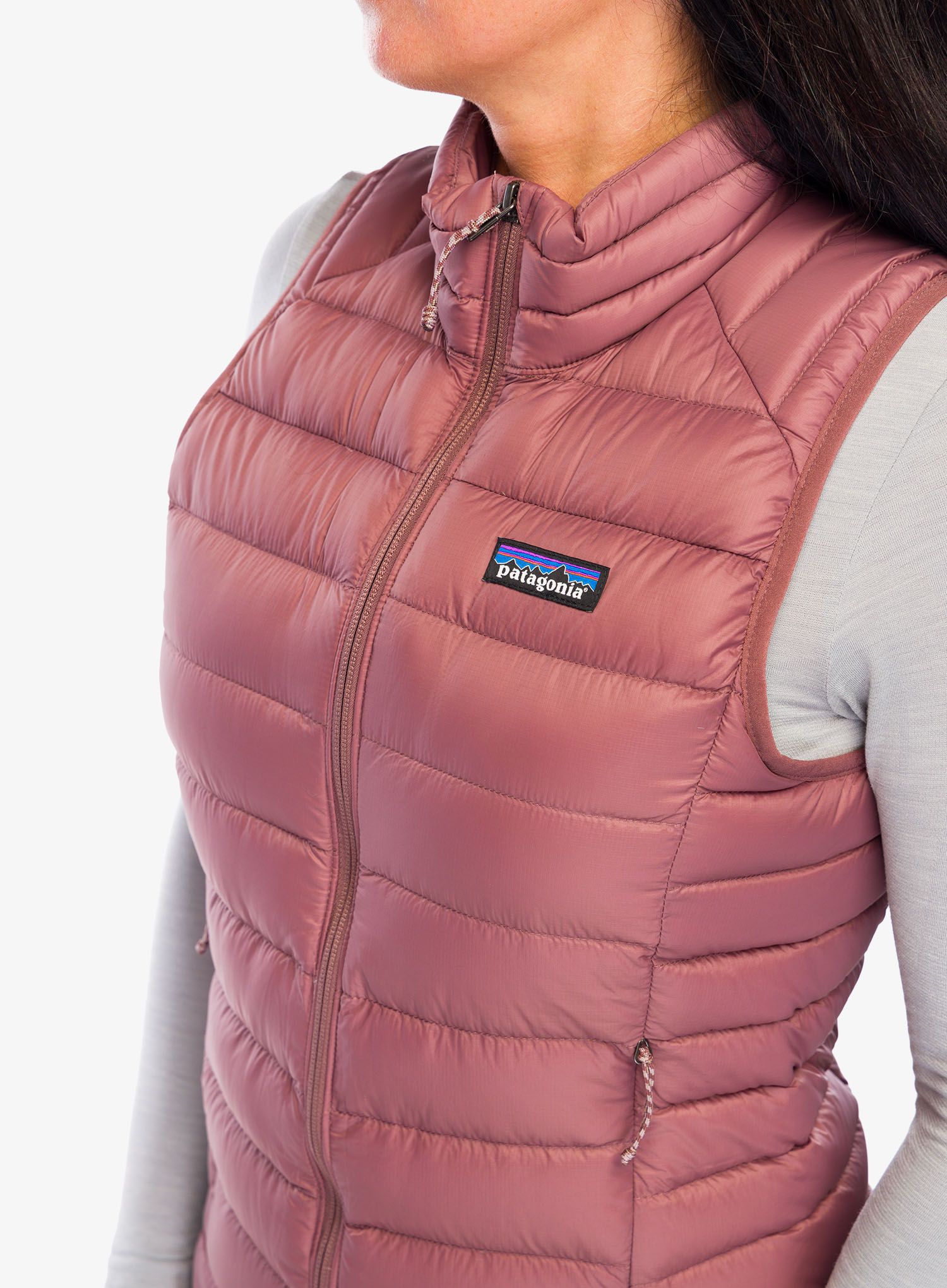 Pūkinė liemenė moteriška Patagonia Down Sweater Vest - dulse mauve